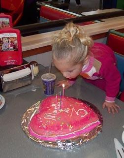 Blow them out Maycie - Click for Happy Birthday Song!!  Click browser back button to return to this page when you have had enough music!